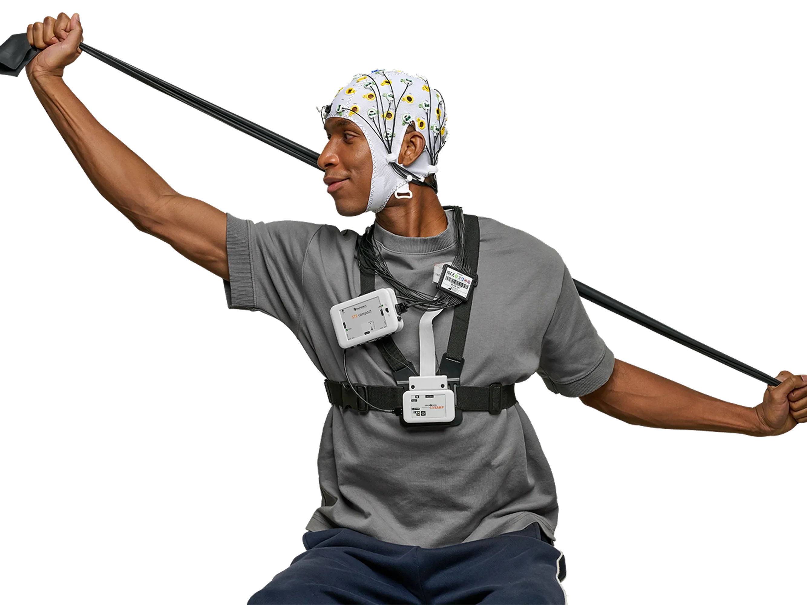 Man in motion while wearing electrode cap and reasearch equipment.